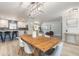 Stylish open-concept dining area connecting to a modern kitchen and a comfortable living space at 3626 Donna St, Port Orange, FL 32129