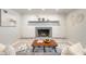 The living room features a fireplace with a mantel, and a wooden coffee table with a grey sofa at 3626 Donna St, Port Orange, FL 32129