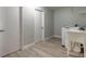Basement Laundry Room, with new washer and dryer and laminate flooring at 3626 Donna St, Port Orange, FL 32129