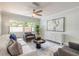 Living room featuring modern furniture, hardwood floors, and ample natural light at 3626 Donna St, Port Orange, FL 32129