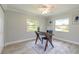Home office featuring bright windows, a modern desk, and a ceiling fan at 3626 Donna St, Port Orange, FL 32129