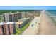An aerial shot showcases the beachfront location and luxurious accommodations at 4139 S Atlantic Ave # B508, New Smyrna Beach, FL 32169