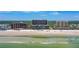 A breathtaking aerial view showcasing the pristine beach and resort amenities at 4139 S Atlantic Ave # B508, New Smyrna Beach, FL 32169