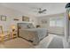 Inviting bedroom with neutral tones, ceiling fan, and comfortable furnishings creating a peaceful retreat at 4403 Sea Mist Dr # 109, New Smyrna Beach, FL 32169