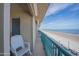 Private balcony with ocean views and a comfortable chair in this charming condo at 4555 S Atlantic Ave # 4405, Ponce Inlet, FL 32127