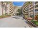Well maintained condo building entrance with professional landscaping and circular drive at 4555 S Atlantic Ave # 4405, Ponce Inlet, FL 32127