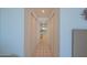 Hallway with tile flooring and closets leading to the rest of the condo at 4555 S Atlantic Ave # 4405, Ponce Inlet, FL 32127
