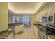 An open concept kitchen provides easy access to the dining and living rooms with updated appliances at 4555 S Atlantic Ave # 4405, Ponce Inlet, FL 32127