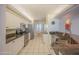 Spacious kitchen with stainless appliances and granite countertops provides a modern, updated feel at 4555 S Atlantic Ave # 4405, Ponce Inlet, FL 32127