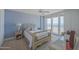 Main bedroom featuring a bed with ocean views and comfortable furniture at 4555 S Atlantic Ave # 4405, Ponce Inlet, FL 32127
