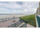 An outdoor patio with comfortable seating areas to relax and enjoy ocean views at 4555 S Atlantic Ave # 4405, Ponce Inlet, FL 32127