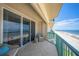 Relax on this balcony with ocean views and comfortable outdoor seating at 4575 S Atlantic Ave # 6607, Ponce Inlet, FL 32127