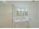Clean bathroom featuring a shower and a vanity with ample storage space at 4575 S Atlantic Ave # 6607, Ponce Inlet, FL 32127