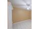 Bedroom with white tile flooring, ceiling fan, and closet at 4575 S Atlantic Ave # 6607, Ponce Inlet, FL 32127