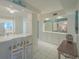 Inviting dining area features bright white tile and ample space for entertaining at 4575 S Atlantic Ave # 6607, Ponce Inlet, FL 32127
