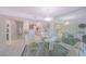Open dining area with eat-in kitchen with views to the living spaces at 4575 S Atlantic Ave # 6607, Ponce Inlet, FL 32127