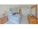 Well-lit main bedroom showcases tile flooring, ocean view, and coastal decor at 4575 S Atlantic Ave # 6607, Ponce Inlet, FL 32127
