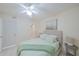 Cozy bedroom featuring a comfortable bed and a view to the ensuite bathroom at 4575 S Atlantic Ave # 6607, Ponce Inlet, FL 32127