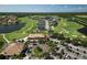 Scenic aerial view of the community with a golf course, lakes, and well-maintained homes at 461 Luna Bella Ln, New Smyrna Beach, FL 32168