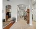 Open hallway showcasing the home's layout, archways, and seamless flow between rooms at 461 Luna Bella Ln, New Smyrna Beach, FL 32168
