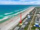 Stunning aerial view of beachside condo with direct ocean access and coastal charm at 4777 S Atlantic Ave # B2, Port Orange, FL 32127