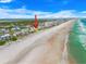 Aerial view of beachfront condos with easy beach access in proximity to local buildings at 4777 S Atlantic Ave # B2, Port Orange, FL 32127