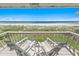 Relaxing oceanfront balcony featuring chairs and breathtaking views of the beach at 4777 S Atlantic Ave # B2, Port Orange, FL 32127