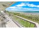 Relaxing balcony with seating and panoramic views of the ocean and beach at 4777 S Atlantic Ave # B2, Port Orange, FL 32127