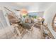 Inviting dining area adjacent to living room, offering ocean views at 4777 S Atlantic Ave # B2, Port Orange, FL 32127