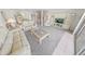 Inviting living room flowing into dining area with ocean views at 4777 S Atlantic Ave # B2, Port Orange, FL 32127