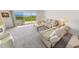 Bright living room with a coastal view and comfortable seating at 4777 S Atlantic Ave # B2, Port Orange, FL 32127