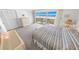 Inviting primary bedroom with a private balcony and stunning ocean views at 4777 S Atlantic Ave # B2, Port Orange, FL 32127