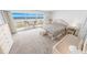 Bright bedroom with a private balcony overlooking the ocean at 4777 S Atlantic Ave # B2, Port Orange, FL 32127