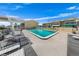 Community pool with several lounge chairs for residents to enjoy at 4777 S Atlantic Ave # B2, Port Orange, FL 32127