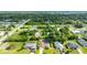 An aerial view of a home in a lush, residential neighborhood at 505 Sandale Ct, Deland, FL 32724