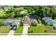 Aerial view of a home, showcasing its layout, yard, and neighboring properties in a quiet community at 505 Sandale Ct, Deland, FL 32724