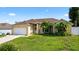 Lovely single-story home boasting a well-kept lawn, mature landscaping, and a convenient two-car garage at 505 Sandale Ct, Deland, FL 32724