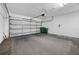 Spacious garage with an automatic door opener and ample space for parking and storage at 505 Sandale Ct, Deland, FL 32724