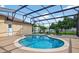 Inviting private swimming pool with a screened enclosure and a spacious patio area at 505 Sandale Ct, Deland, FL 32724