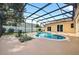 Screened-in pool with a spacious patio, perfect for outdoor relaxation and enjoying the landscaped backyard at 505 Sandale Ct, Deland, FL 32724