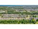 Neighborhood aerial view highlighting proximity to the water, shopping, and surrounding community at 518 Safe Harbor Dr, Edgewater, FL 32141