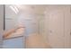 Well-lit bathroom featuring a double sink vanity and a glass-enclosed shower stall at 5263 Bear Corn Run, Port Orange, FL 32128