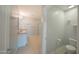 Modern bathroom boasts double sink vanity, shower, and separate toilet area at 5263 Bear Corn Run, Port Orange, FL 32128