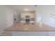 Open concept kitchen with stainless steel appliances, and a large kitchen island, perfect for entertaining and meal prep at 5263 Bear Corn Run, Port Orange, FL 32128