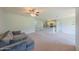 The living room seamlessly connects to the kitchen with an open layout at 5263 Bear Corn Run, Port Orange, FL 32128
