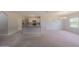 Inviting living area features an open floor plan and flows into the kitchen area at 5263 Bear Corn Run, Port Orange, FL 32128