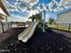 Community playground with slides and climbing equipment, set in a safe and fun environment for children at 5263 Bear Corn Run, Port Orange, FL 32128