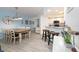 Dining room with seating for six, island seating and decor; bright and airy with lots of space at 5300 S Atlantic Ave # 11302, New Smyrna Beach, FL 32169