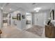 Bright foyer with tile flooring, chandelier, and a stylish rug creates a welcoming atmosphere at 544 Bottlebrush Ct, New Smyrna Beach, FL 32168