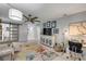 Cozy den with desk, seating, and a stylish barn door that leads to a sink and vanity at 544 Bottlebrush Ct, New Smyrna Beach, FL 32168